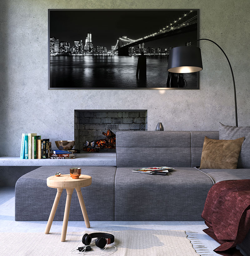Salón moderno con un sofá, una mesa auxiliar, alfombra y lámpara de pie