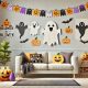 Salón decorado para Halloween con imprimibles y recortables de fantasmas y calabazas
